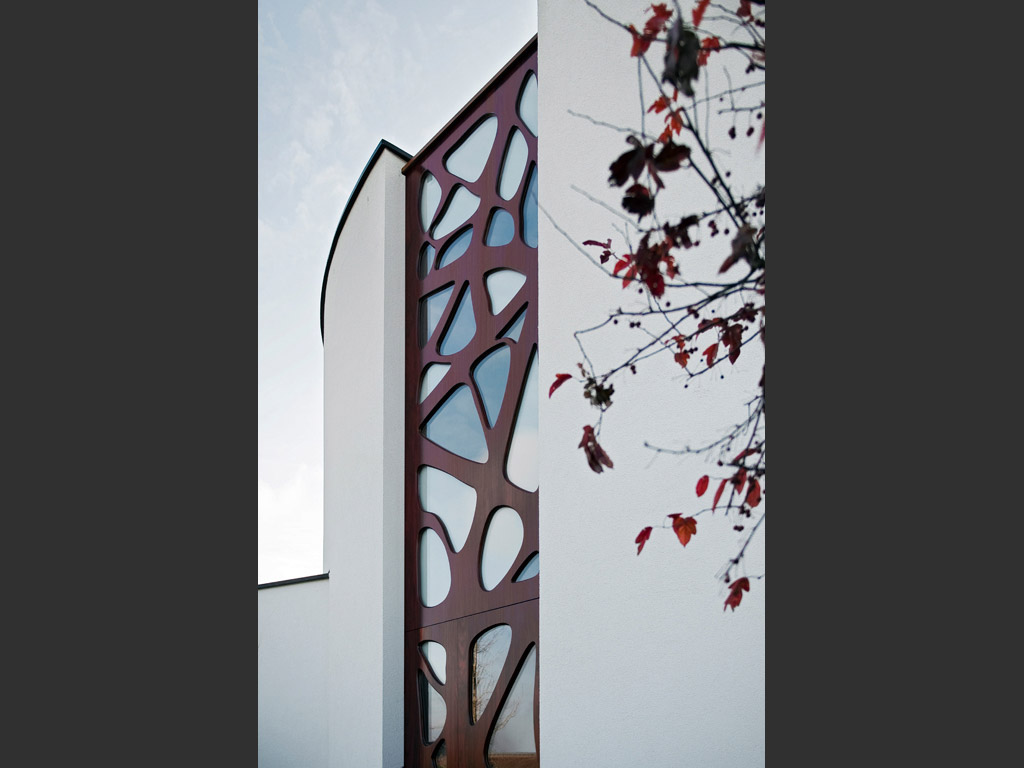 Jugenstil inspired entrance made from Padauk wood.