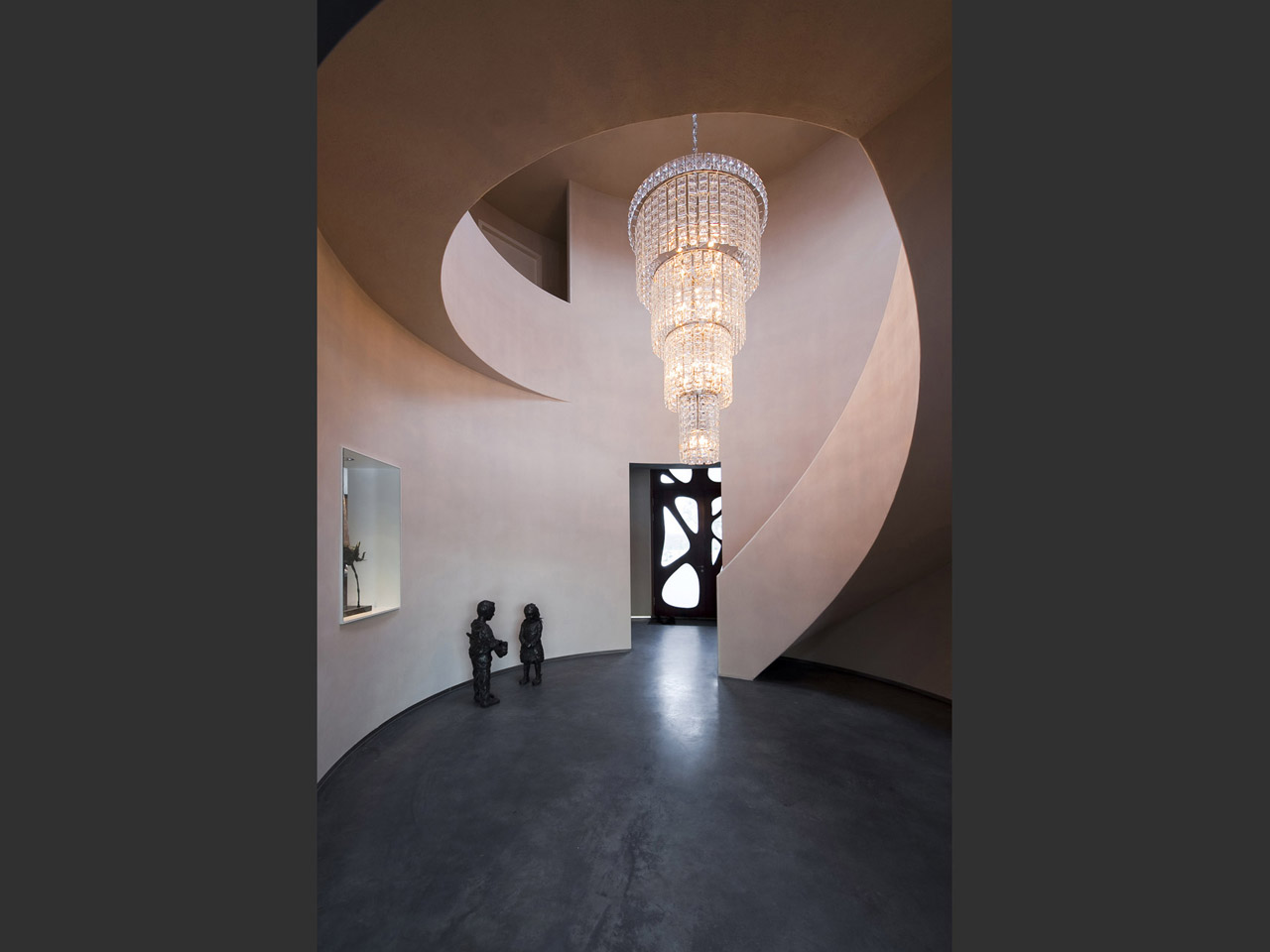 Central hall with spiral staircase, like the inside of a nautilus shell.