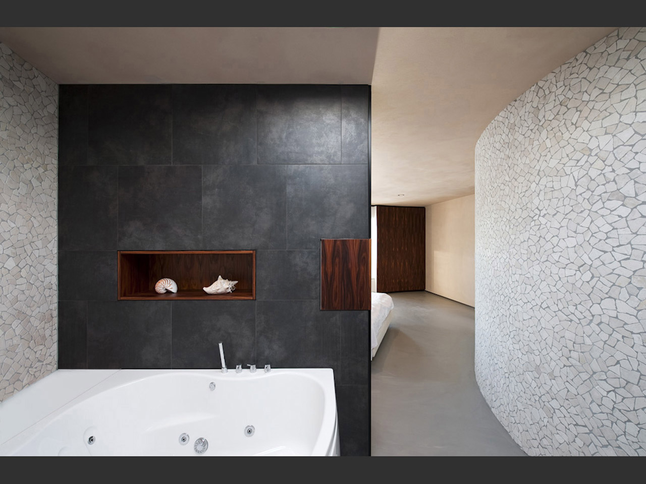 Ensuite bathroom with nautical feel and mosaic tiles.